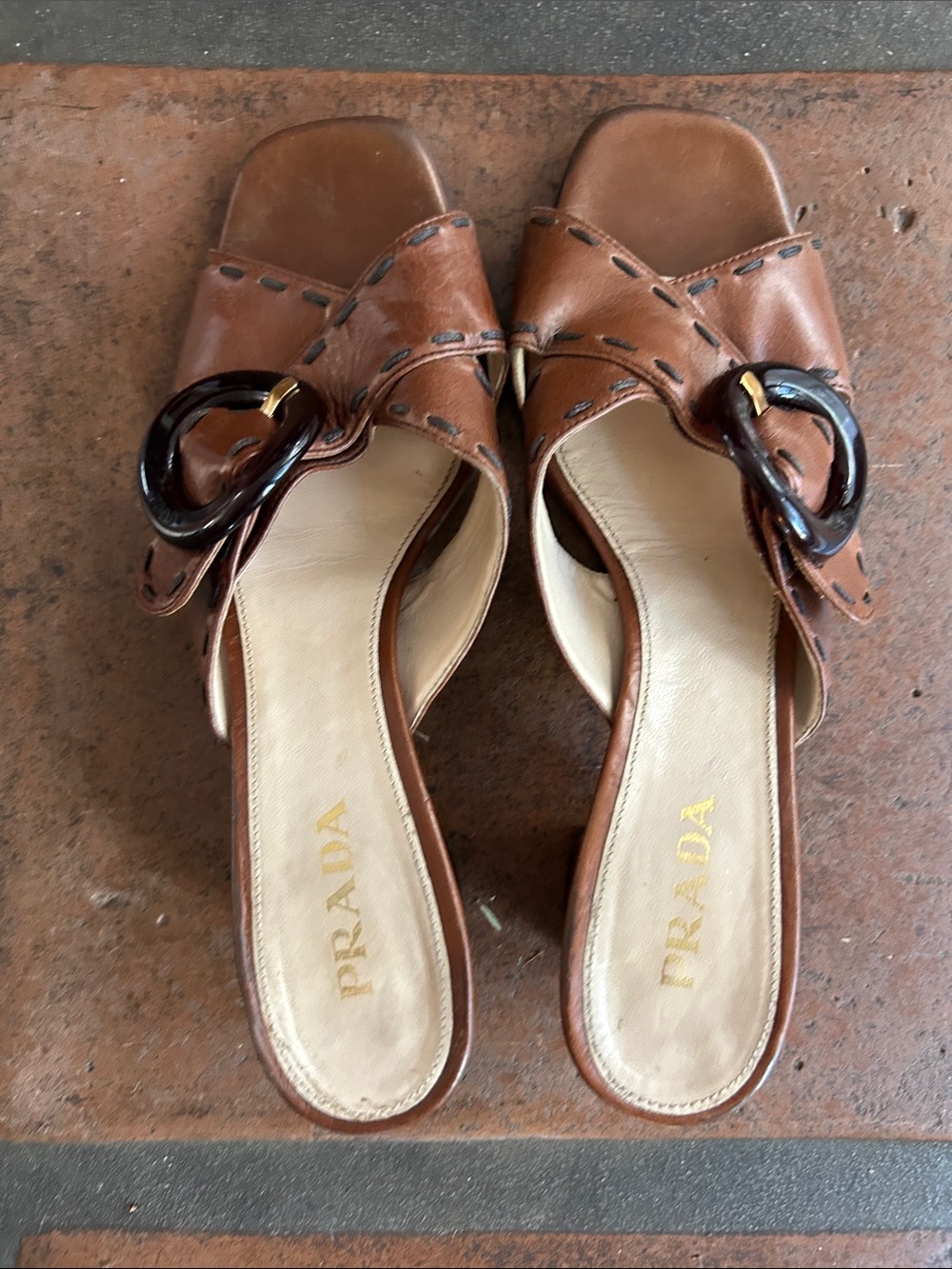 Prada Brown Leather Crisscross Mules with Tortoiseshell Buckle